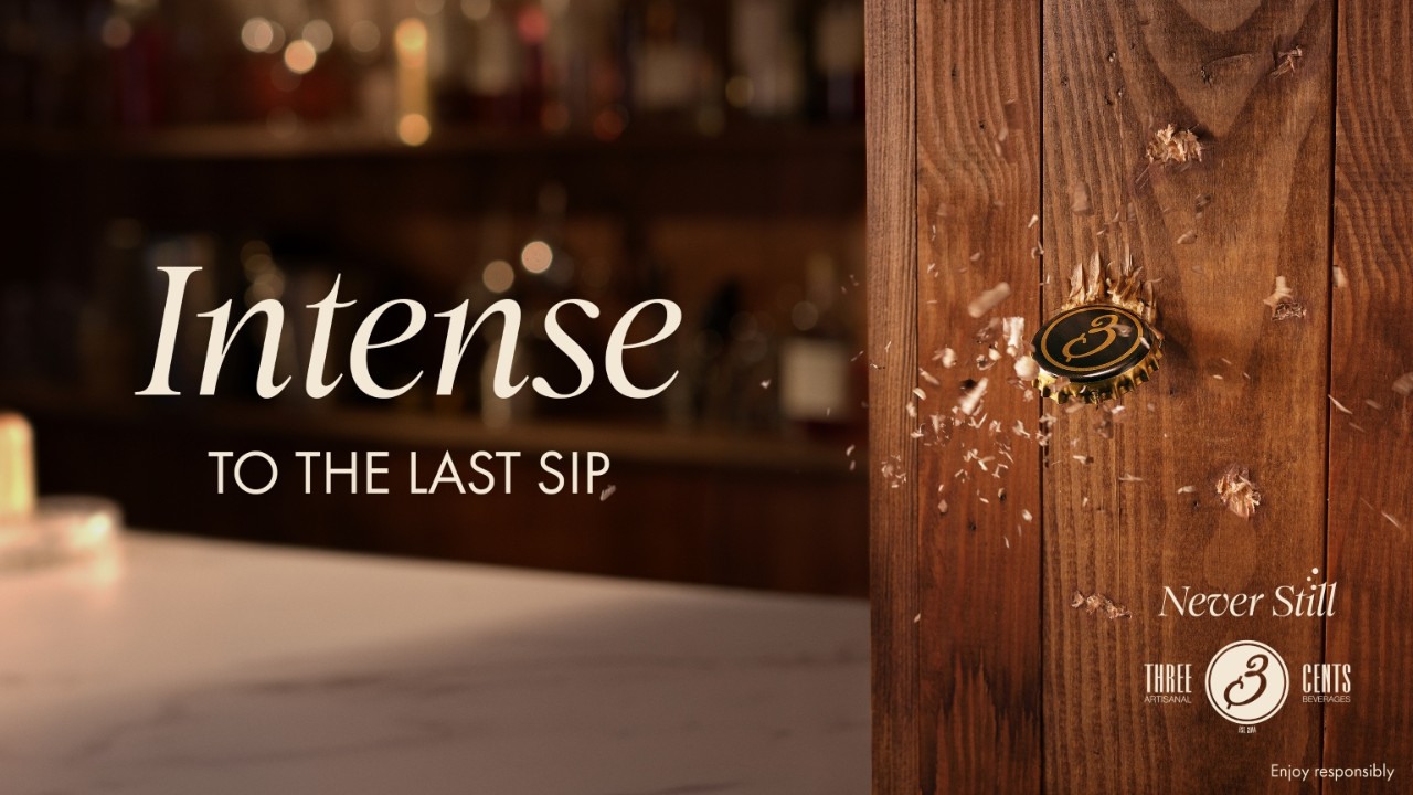 Poster image for 'Intense to the Last Sip', a Three Cents lobal campaign, with the text title nad logo in front of an image of a wooden beam